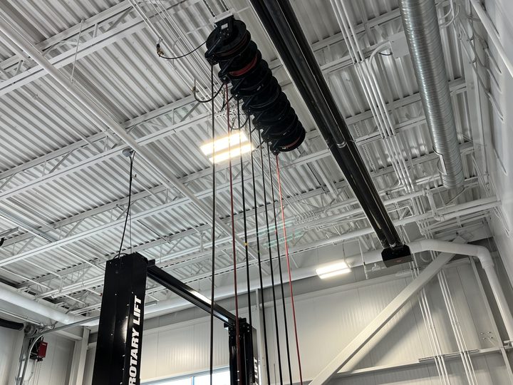 Overhead oil and air reels above a Rotary lift