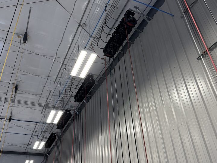Overhead reels along the wall
